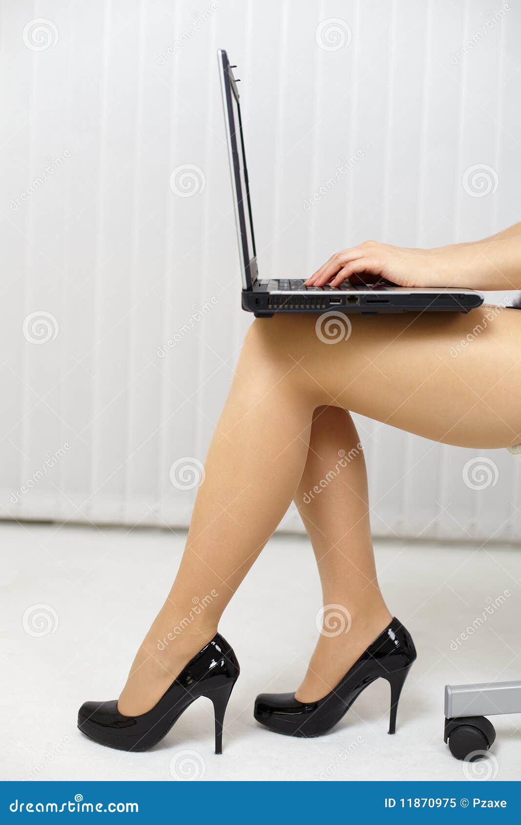 Beautiful Female Legs with Laptop Lying on Lap Stock Image Image of