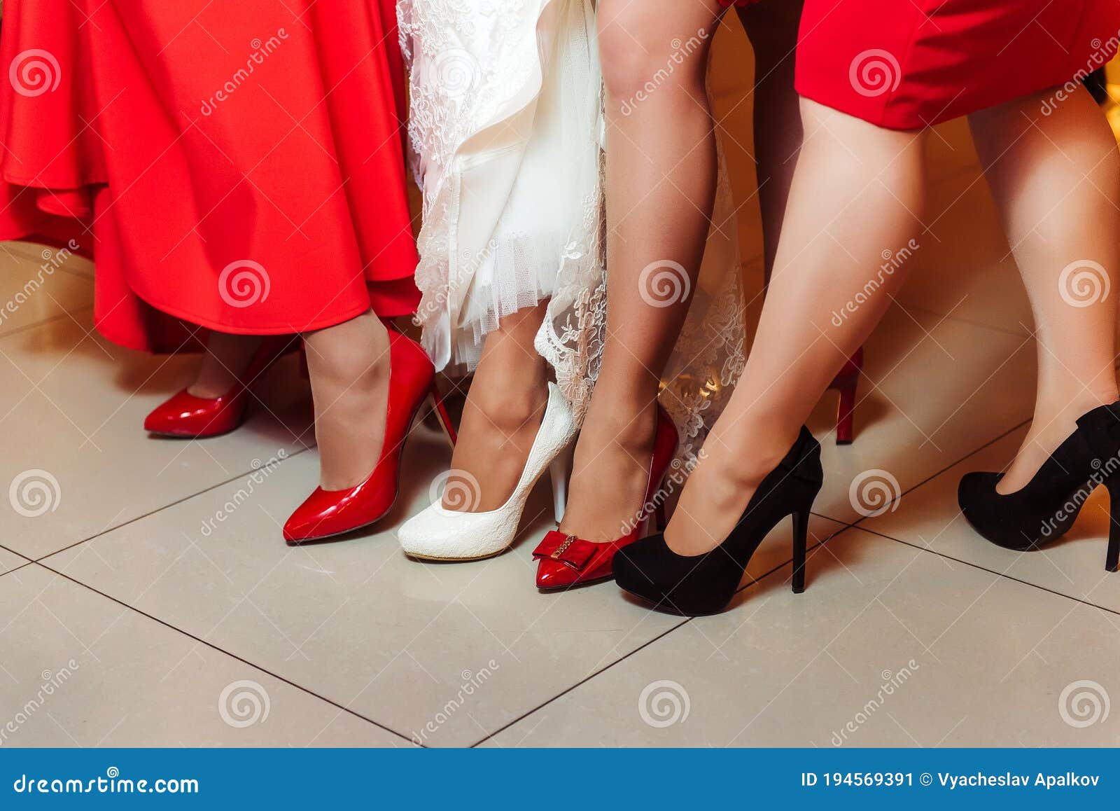 Beautiful Female Legs. Several Girls in Designer Shoes Stock Image - Image  of body, foot: 194569391