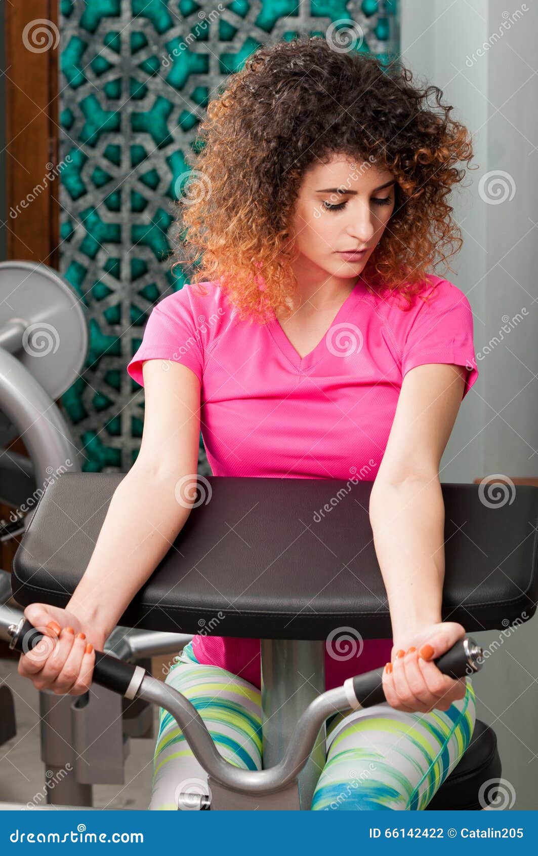 Beautiful Female Pull Up the Biceps Handle Machine Stock Photo Image