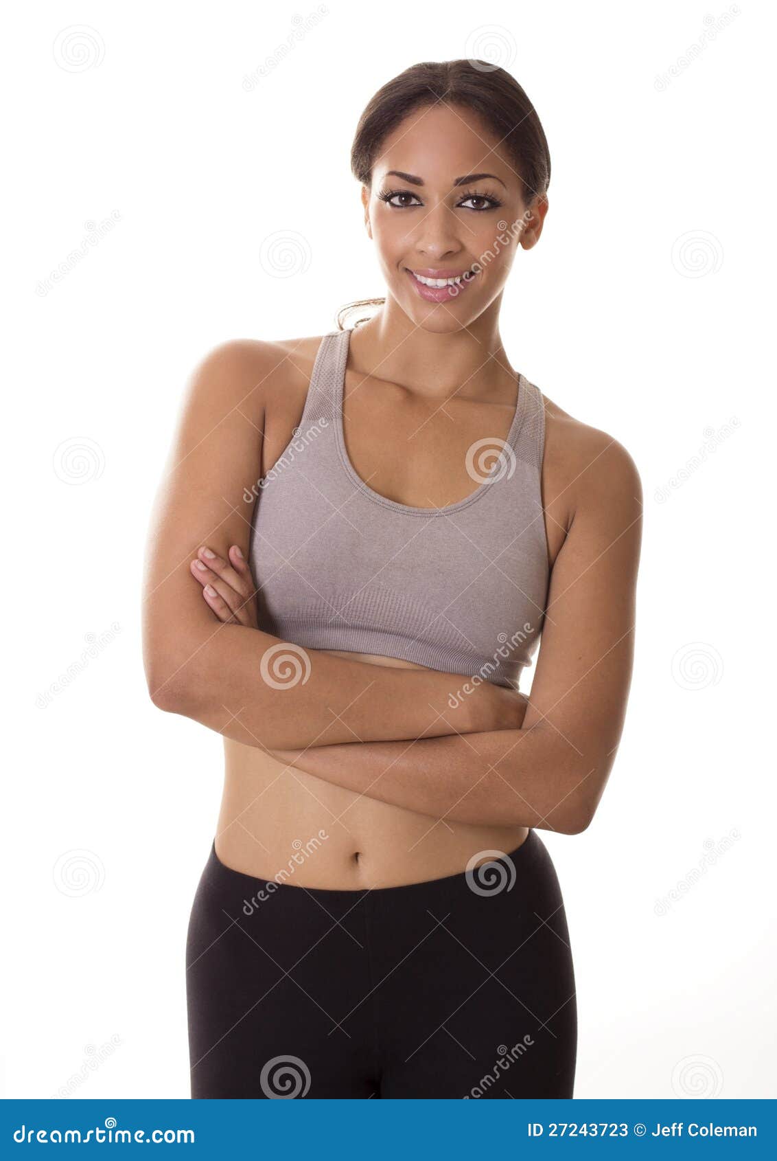 A Beautiful Fit Woman Smiles in Workout Clothes. Stock Image