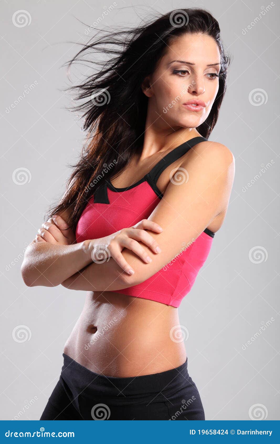 An Older Woman In A Sports Bra Folding Her Arms. Stock Photo, Picture and  Royalty Free Image. Image 25390254.