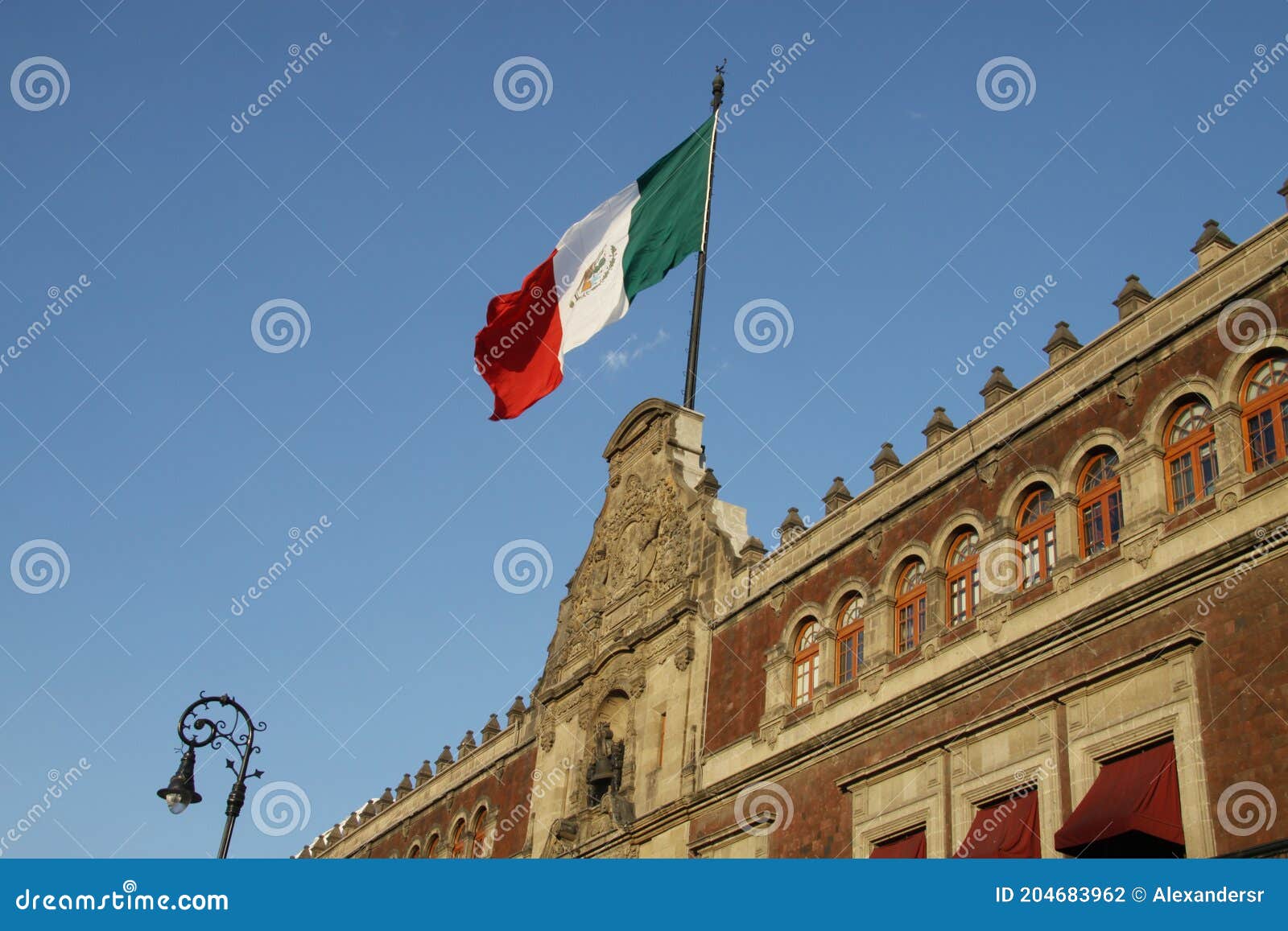 beautiful flag of mexico waving from above palacio de gobierno or national palace, mexico df, mexico