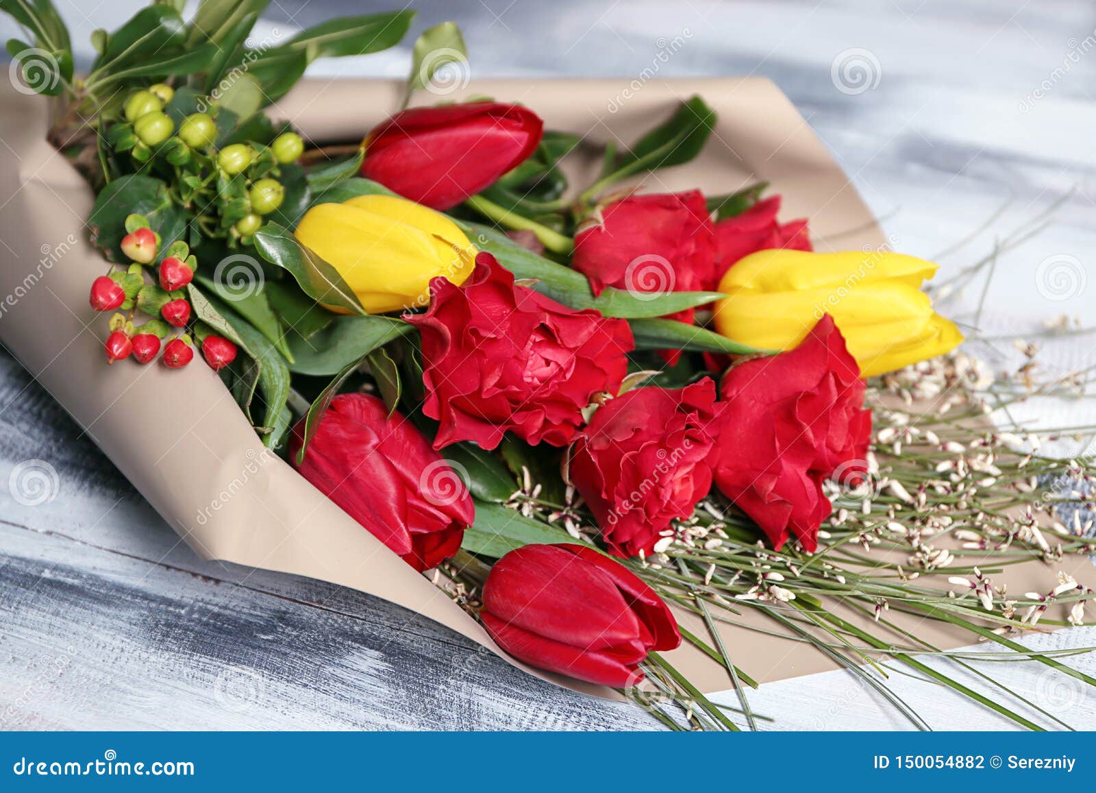 Beautiful Flowers As Gift On Wooden Background Stock Photo Image of