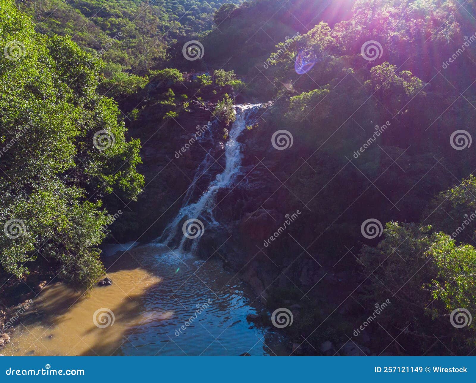 beautiful flowing waterfall in los filtros viejos park at morelia, michoacan, mexico