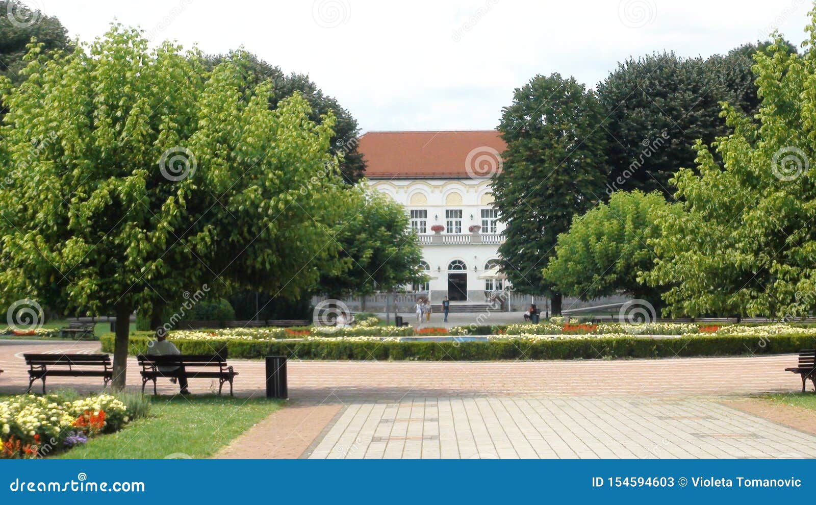 Beautiful Formal Garden Park With Trees Bush Flowers And