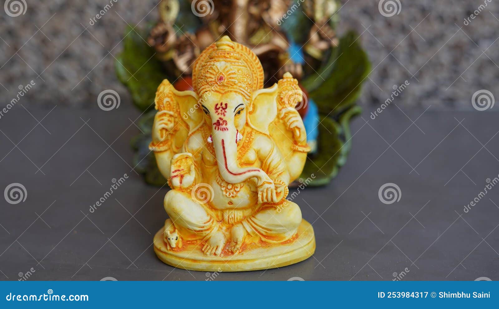 Beautiful Ganesha Idol Against Decorative Background. Clear Space ...