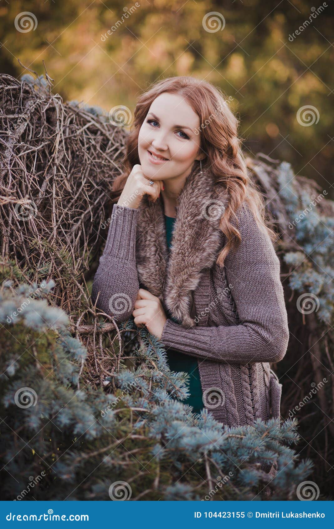 beautiful genuine lady mystic with curly brunette hairs and adorable eyes dressed in fancy stylish warm clothes with fur on neck l