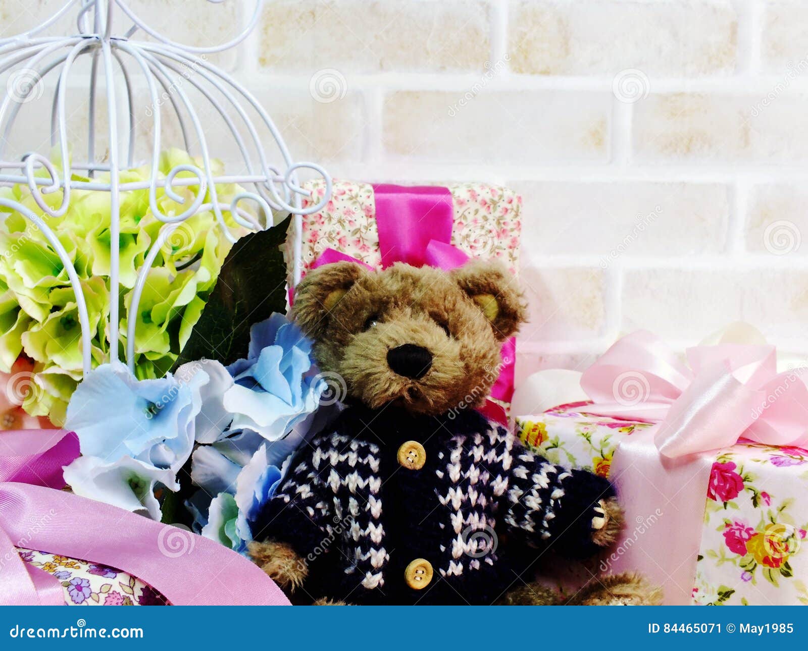 Beautiful Gift Box with Teddy Bear and Artificial Flower Bouquet Stock