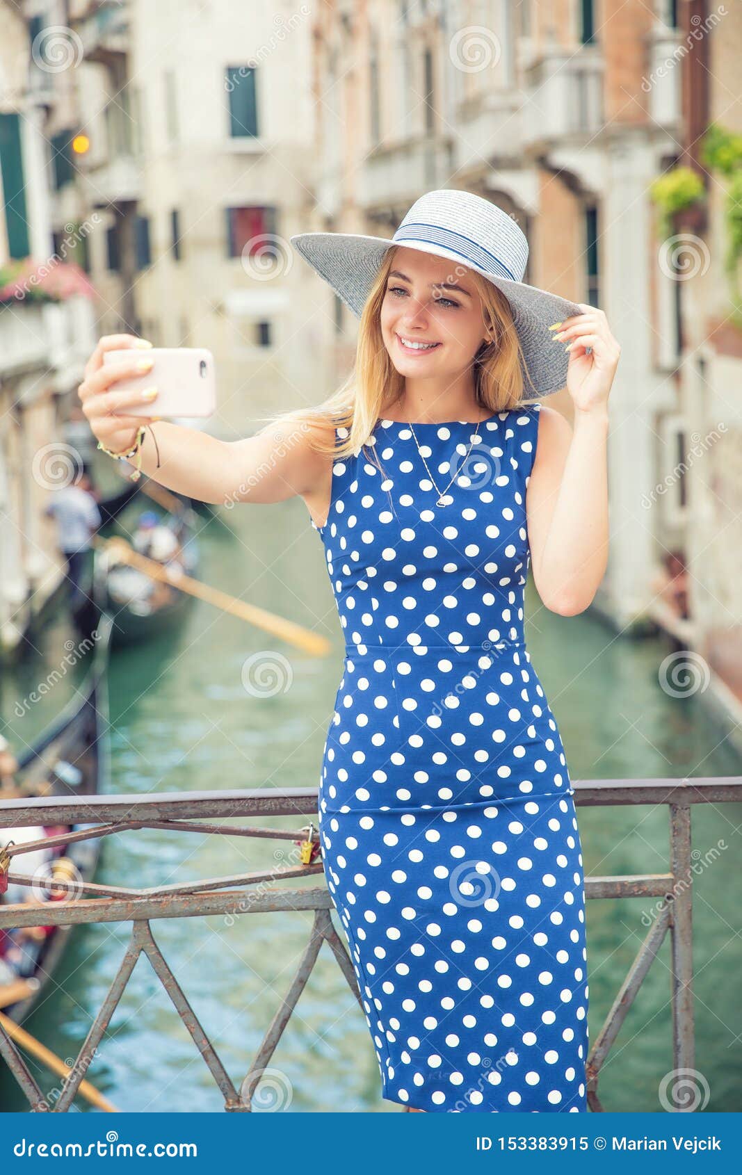 Beautiful Gir Traveler Tourist In Blue Polka Dot Dress