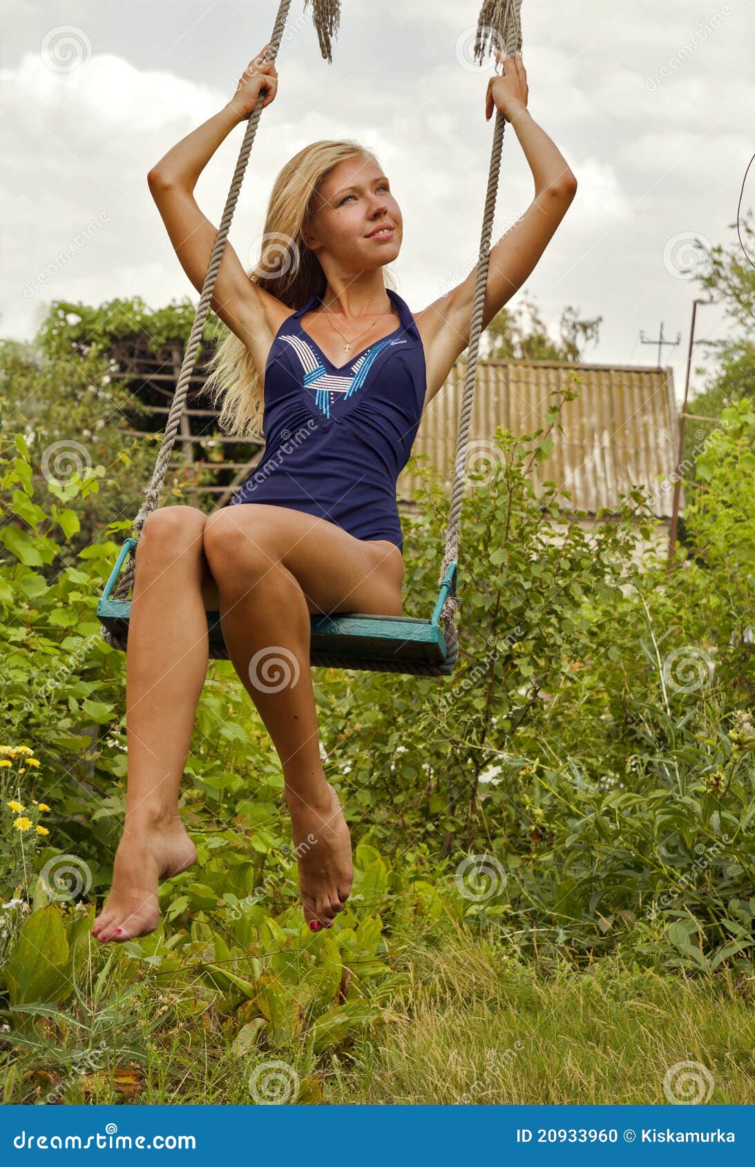 The Beautiful Girl In A Bathing Suit On A Swing Stock Photo Image Of Suit Bathing