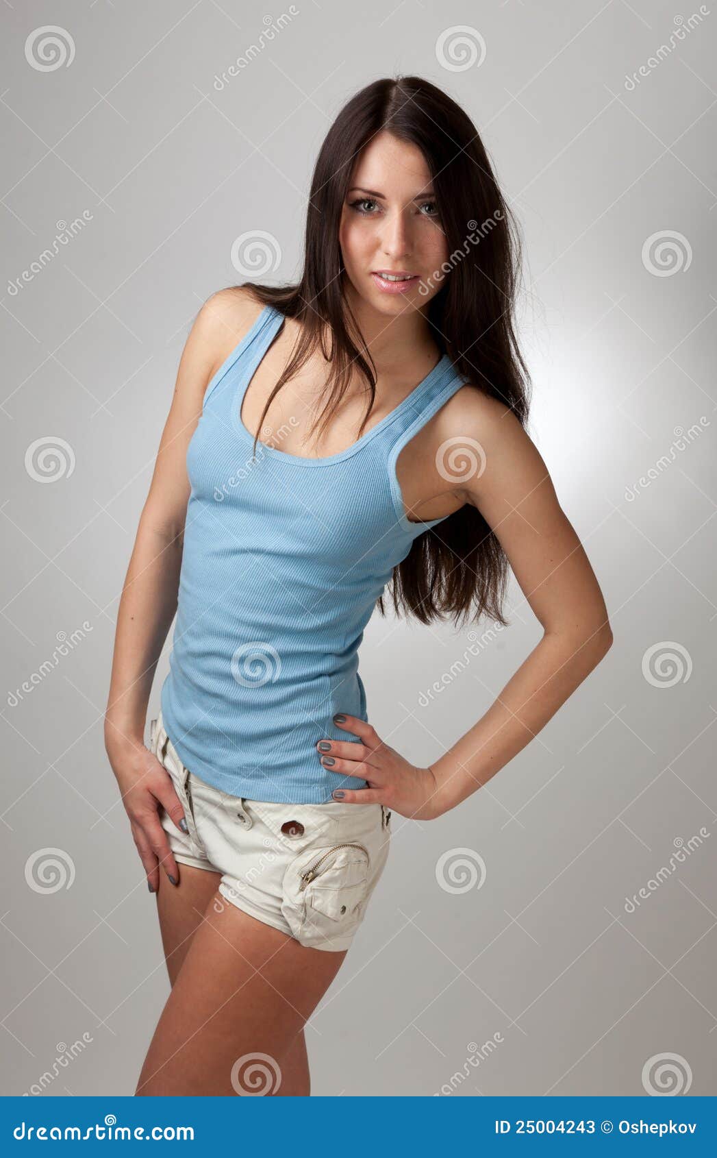 A Beautiful Girl in a Blue T-shirt with a Gray Bac Stock Image - Image ...