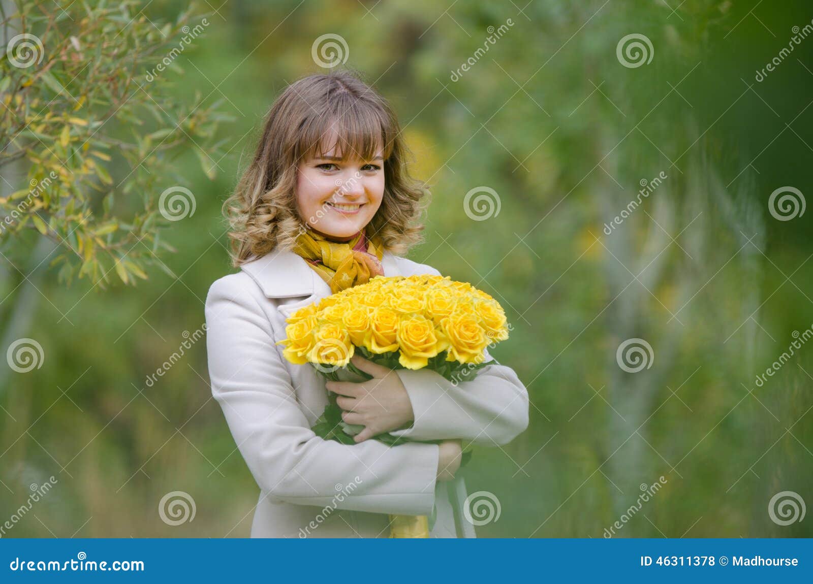 Beautiful Girl with a Bouquet of Yellow Roses Stock Photo - Image of ...