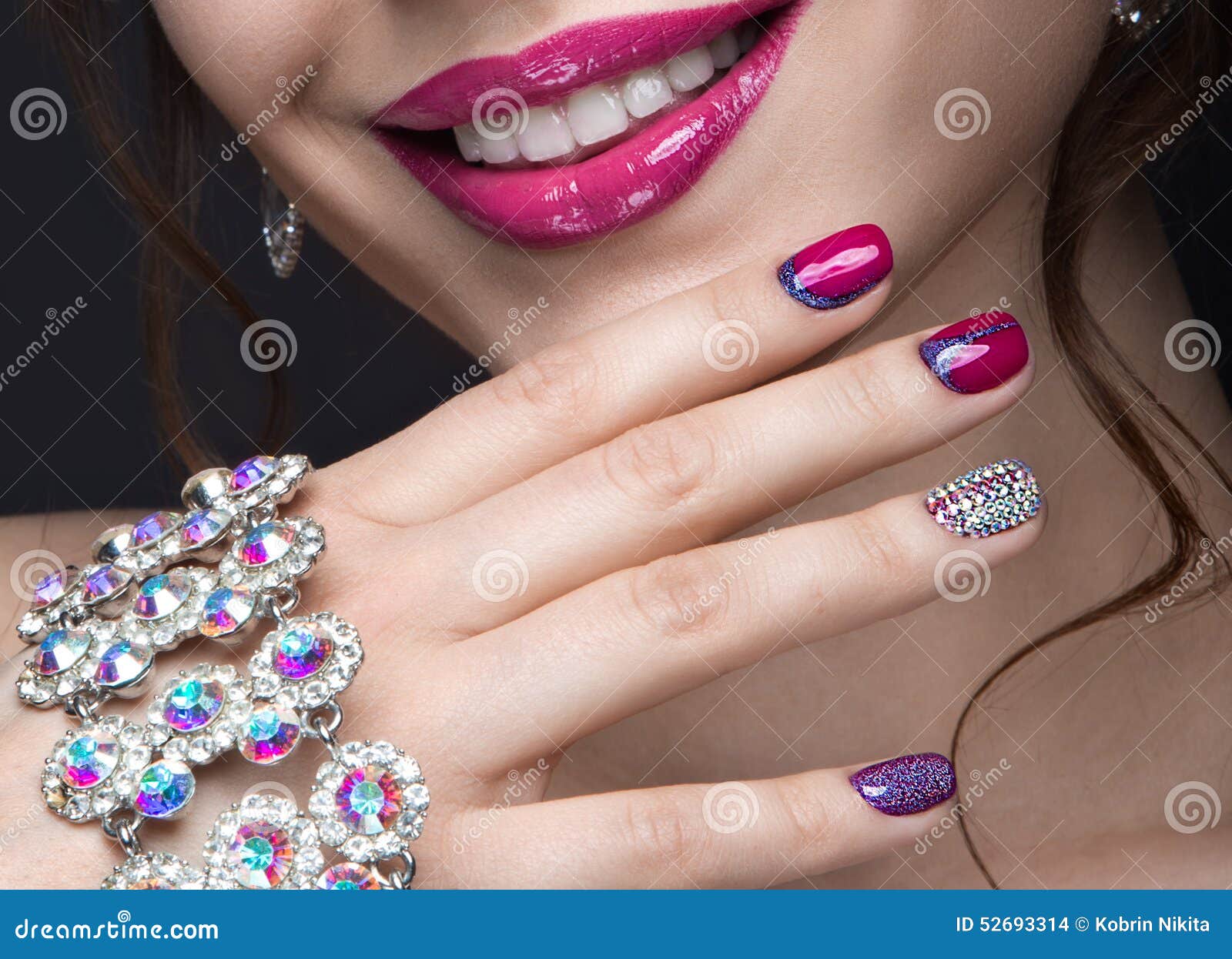Beautiful Girl With A Bright Evening Make Up And Pink Manicure With