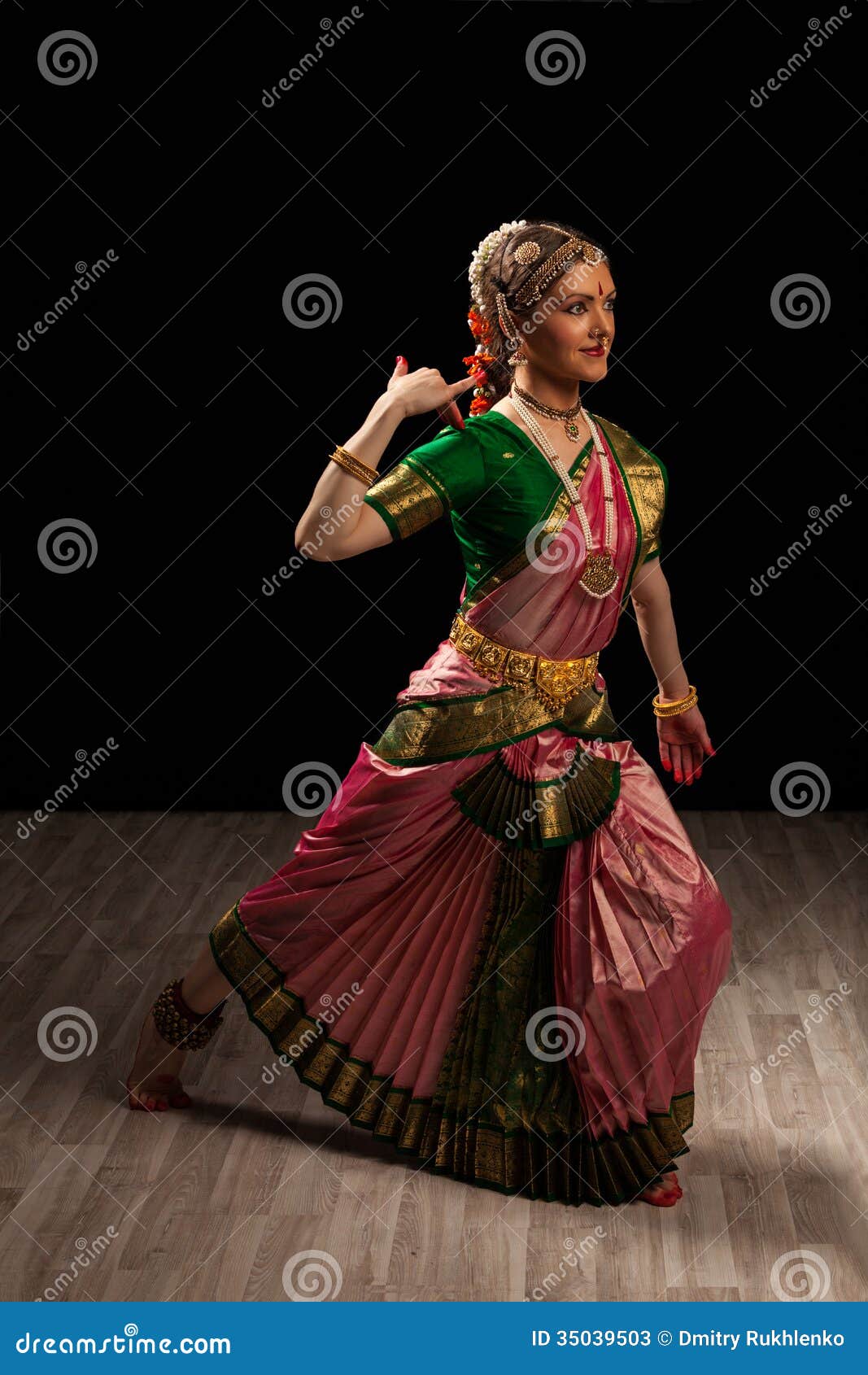 Natraj Academy Of Performing Arts Pvt.Ltd. - Hairstyle of a Bharatnatyam  Dancer A Straight Plait is made either of artificial hair if hair is short  and taken form the centre of the