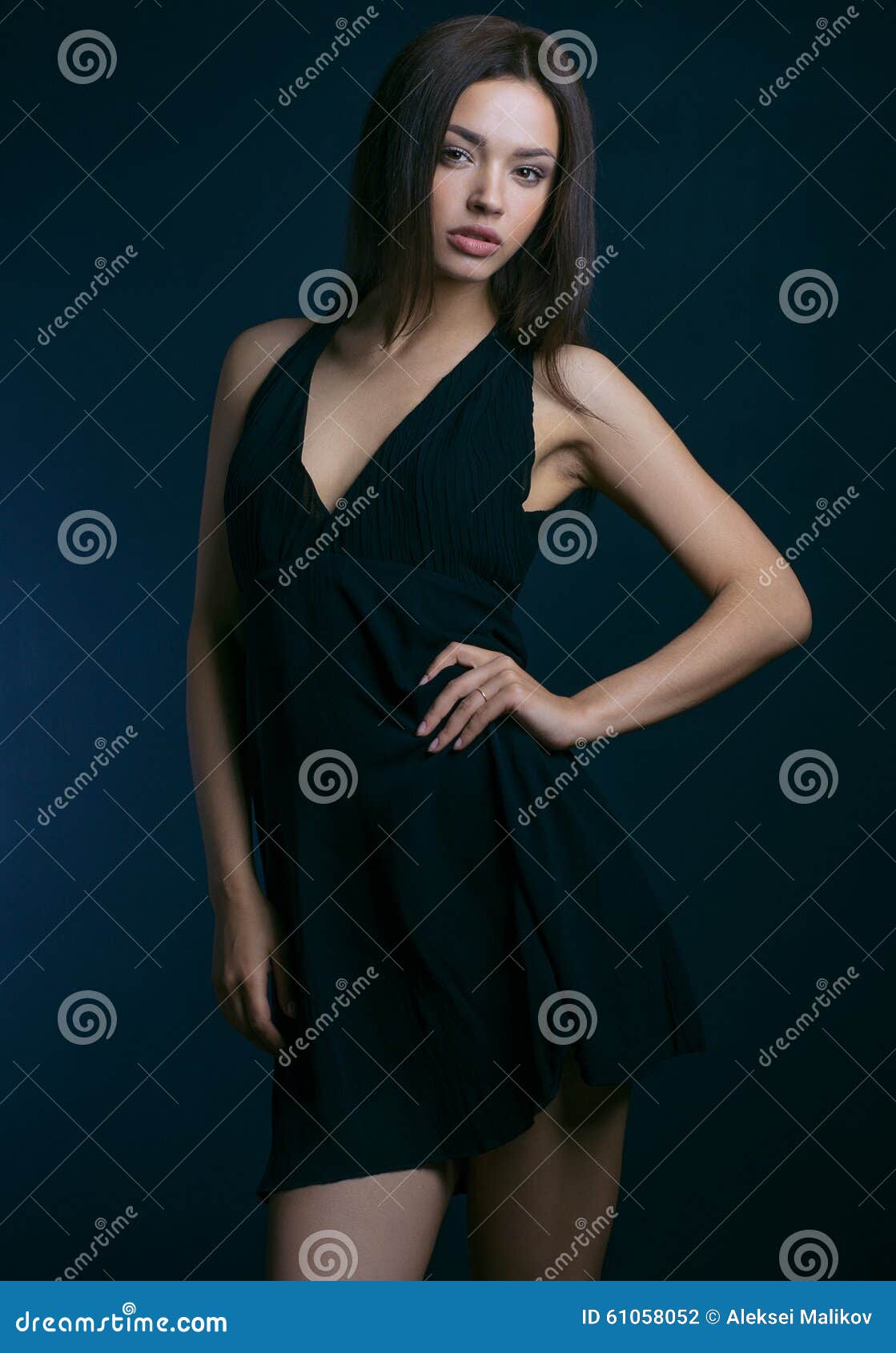Beautiful Girl in the Dress Topic: Charming Brunette in a Black Dress ...