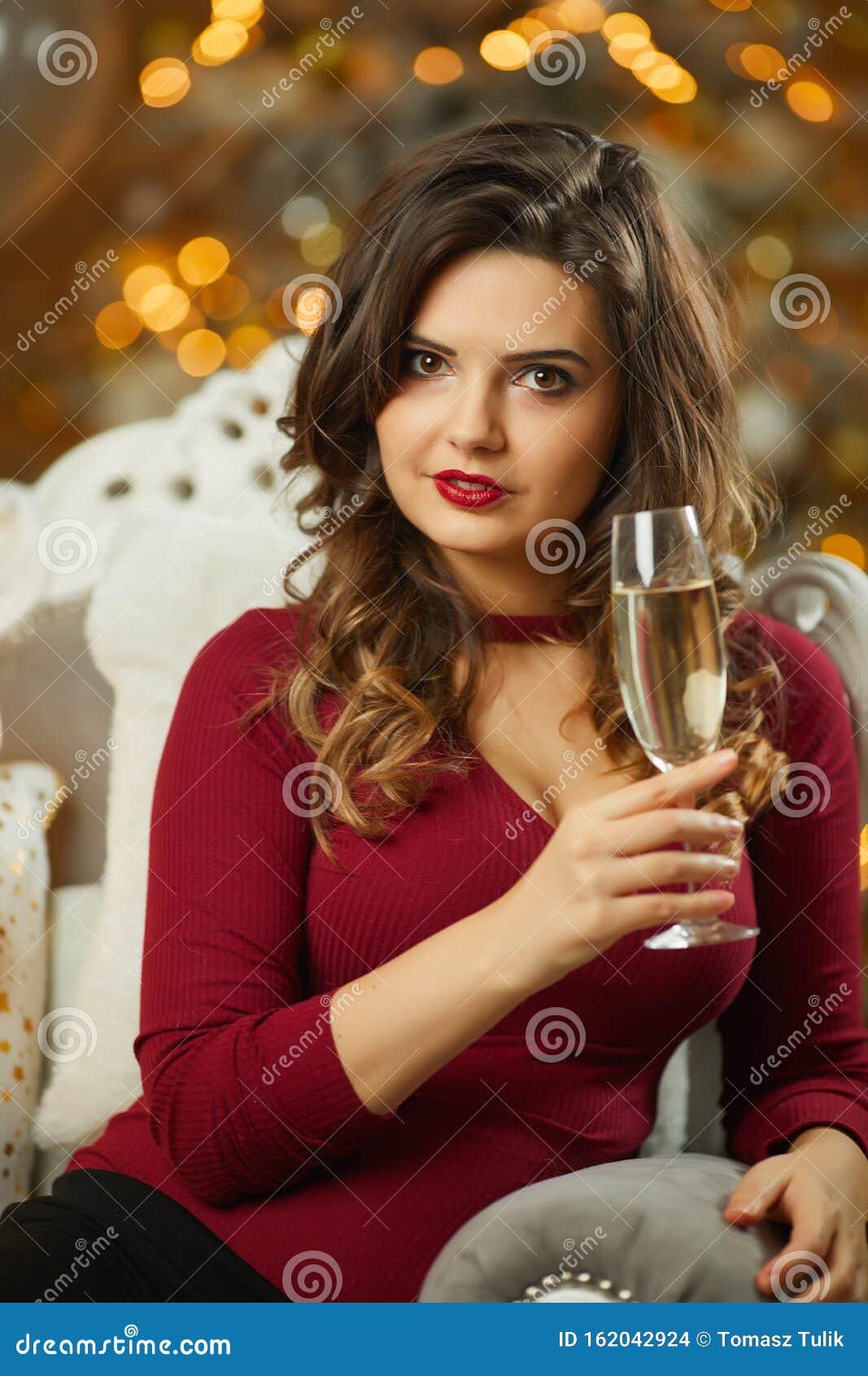 Beautiful Girl In Evening Dress Sitting On Christmas