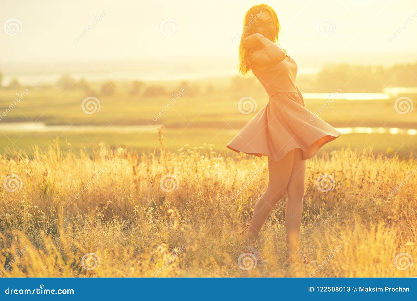 girl in field sunset