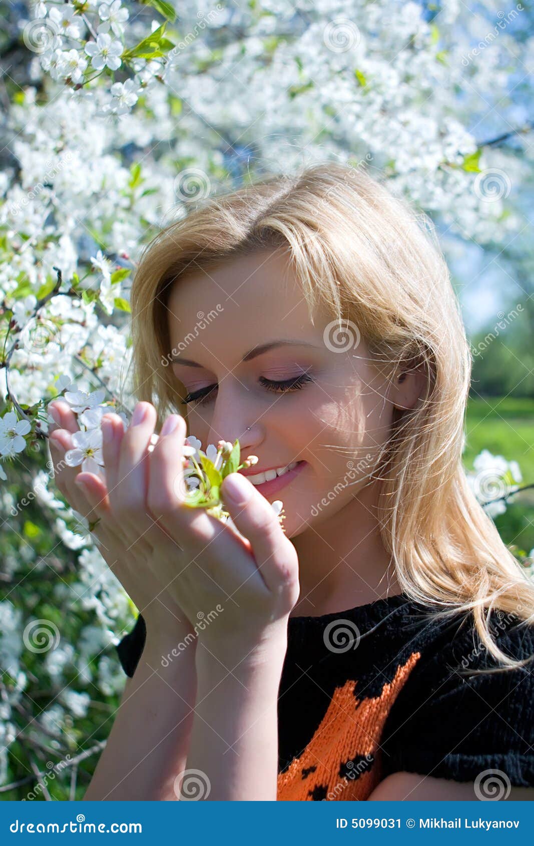 The beautiful girl among flowers in garden - beautiful-girl-flowers-garden-5099031