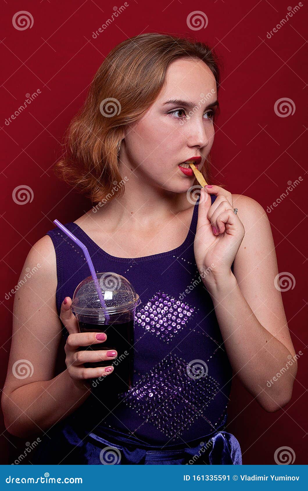 Beautiful Girl with French Fries and Drink Stock Image - Image of