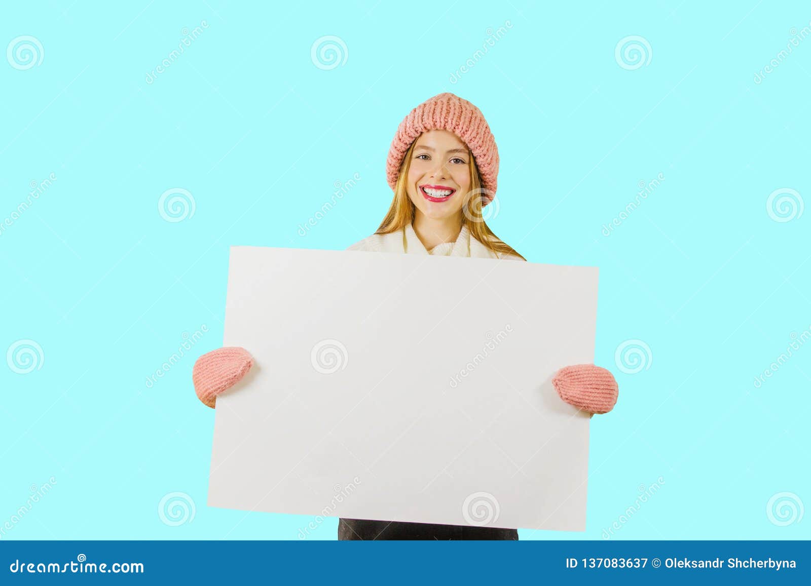 Beautiful Girl Holding A Blank Poster For Text Or ...