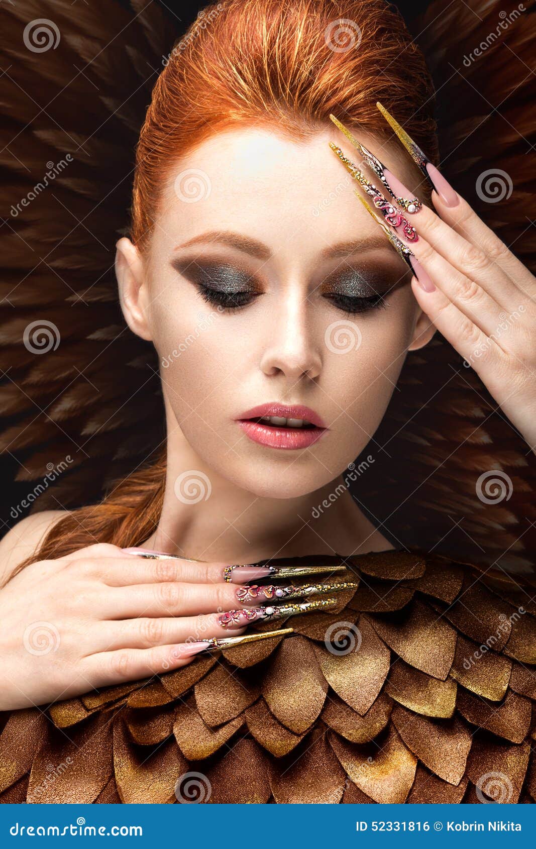 Beautiful Girl in the Image of the Phoenix with Bright Makeup, Long ...
