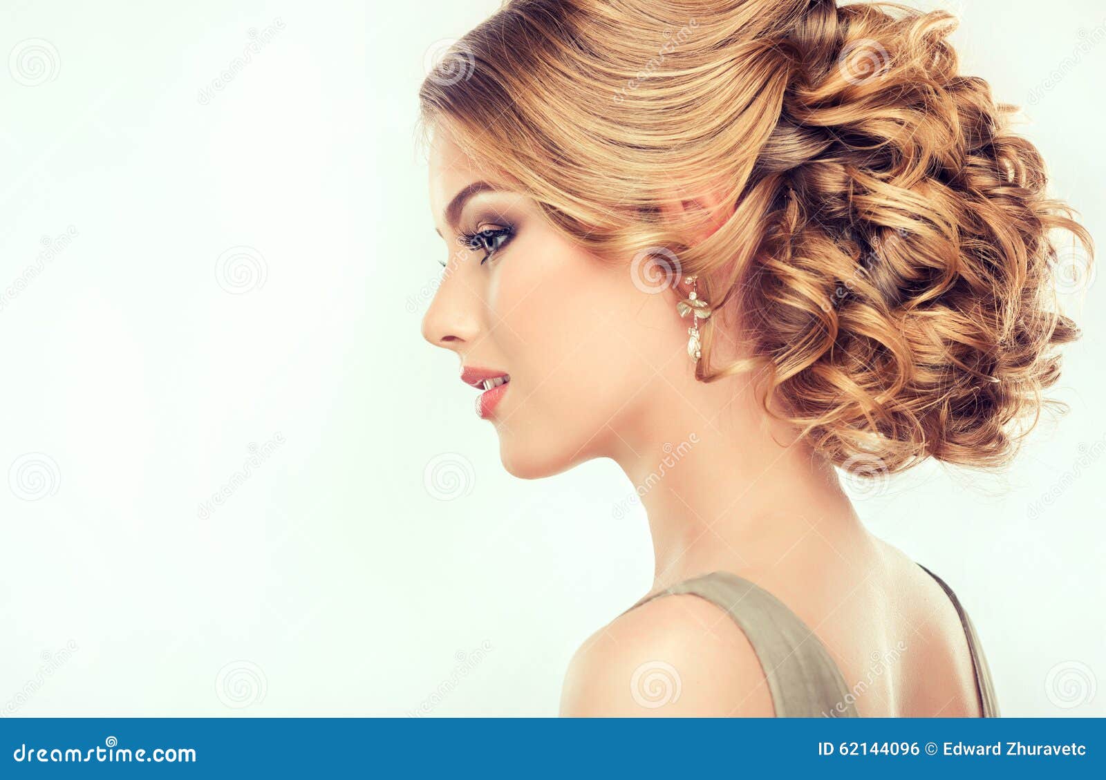 beautiful girl light brown hair with an elegant hairstyle