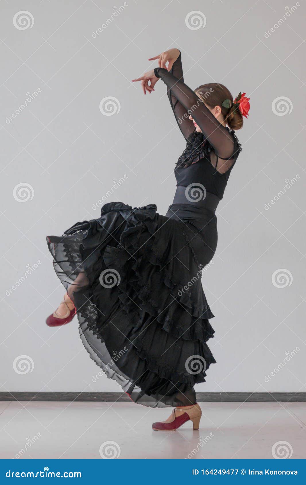 Beautiful Girl in a Long Black Dress and a Red Rose in Her Hair Dancing Flamenco Stock Image - Image of active, caucasian: 164249477 Beautiful Girl in a Long Black Dress and a Red Rose in Her Hair Dancing Flamenco Stock Image - Image of active, caucasian: 164249477