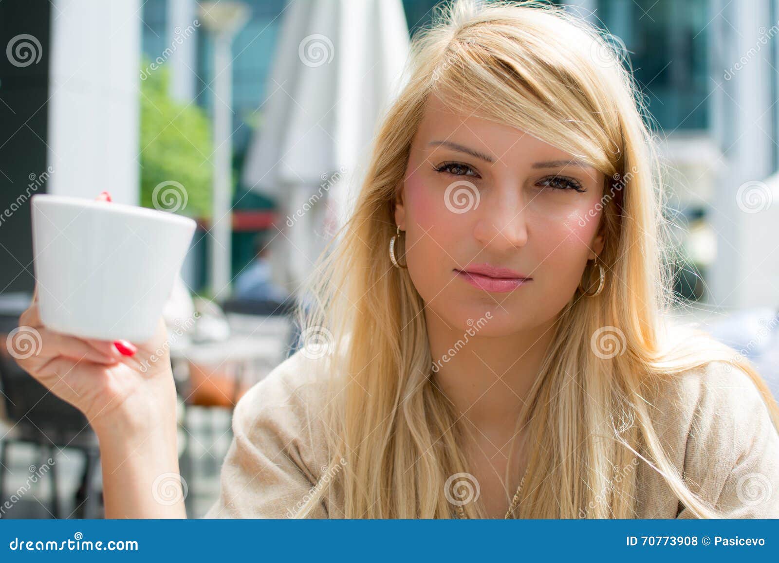 Beautiful Girl With Long Blonde Hair Drinking Coffee Stock Photo