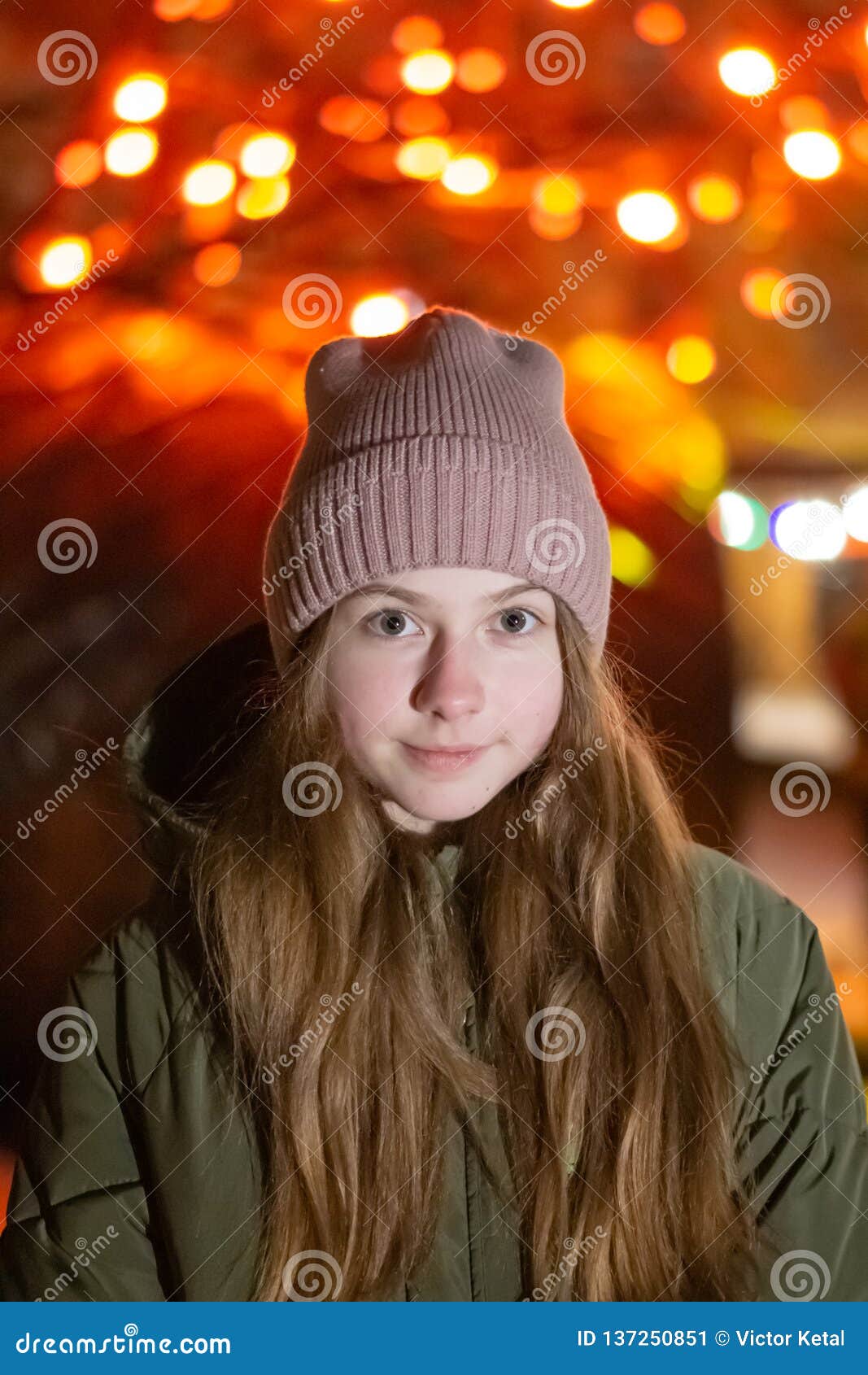 Beautiful Girl Looking Down on the Night City Street Against the ...