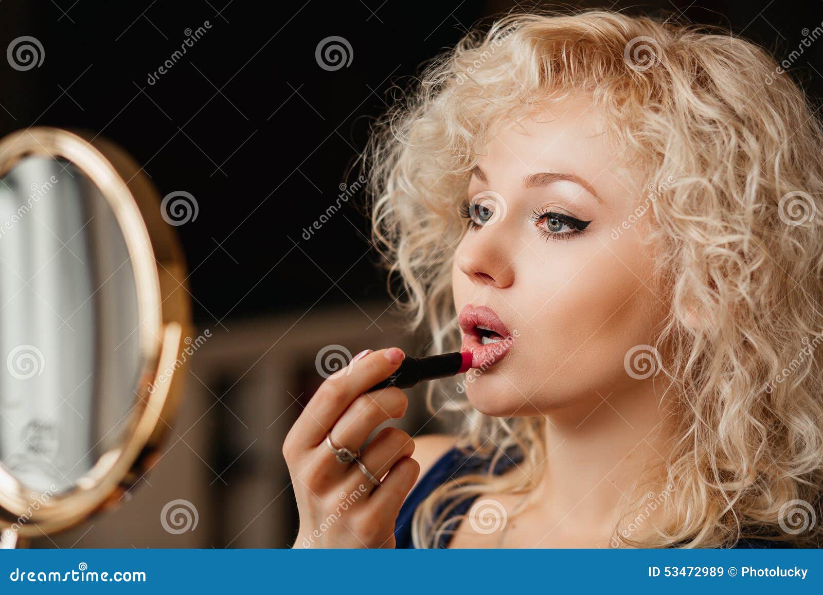 Beautiful Girl Looks in the Mirror and Lipstick Stock Image Image of