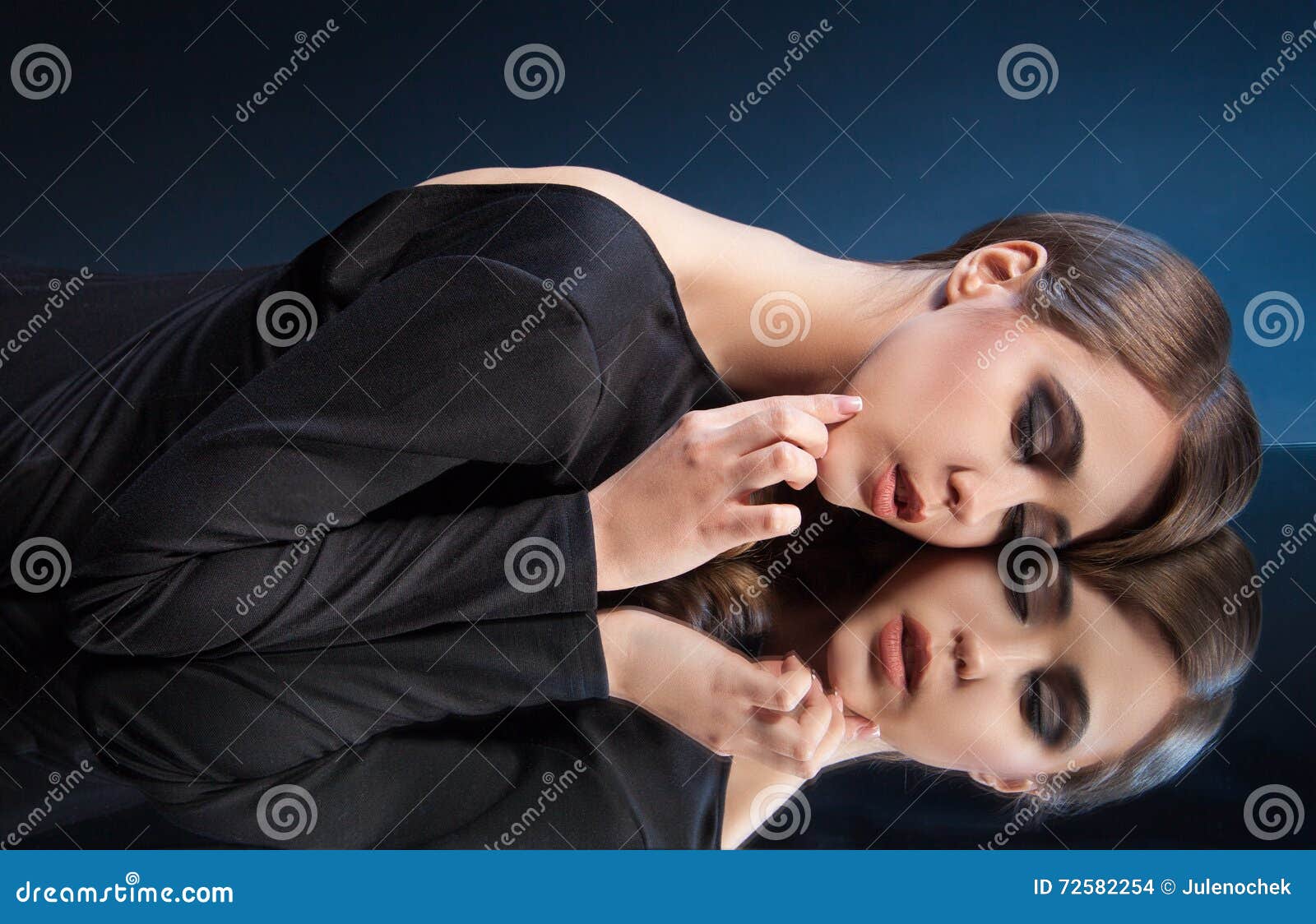 Beautiful Girl Lying on Mirror Surface Stock Photo Image of person