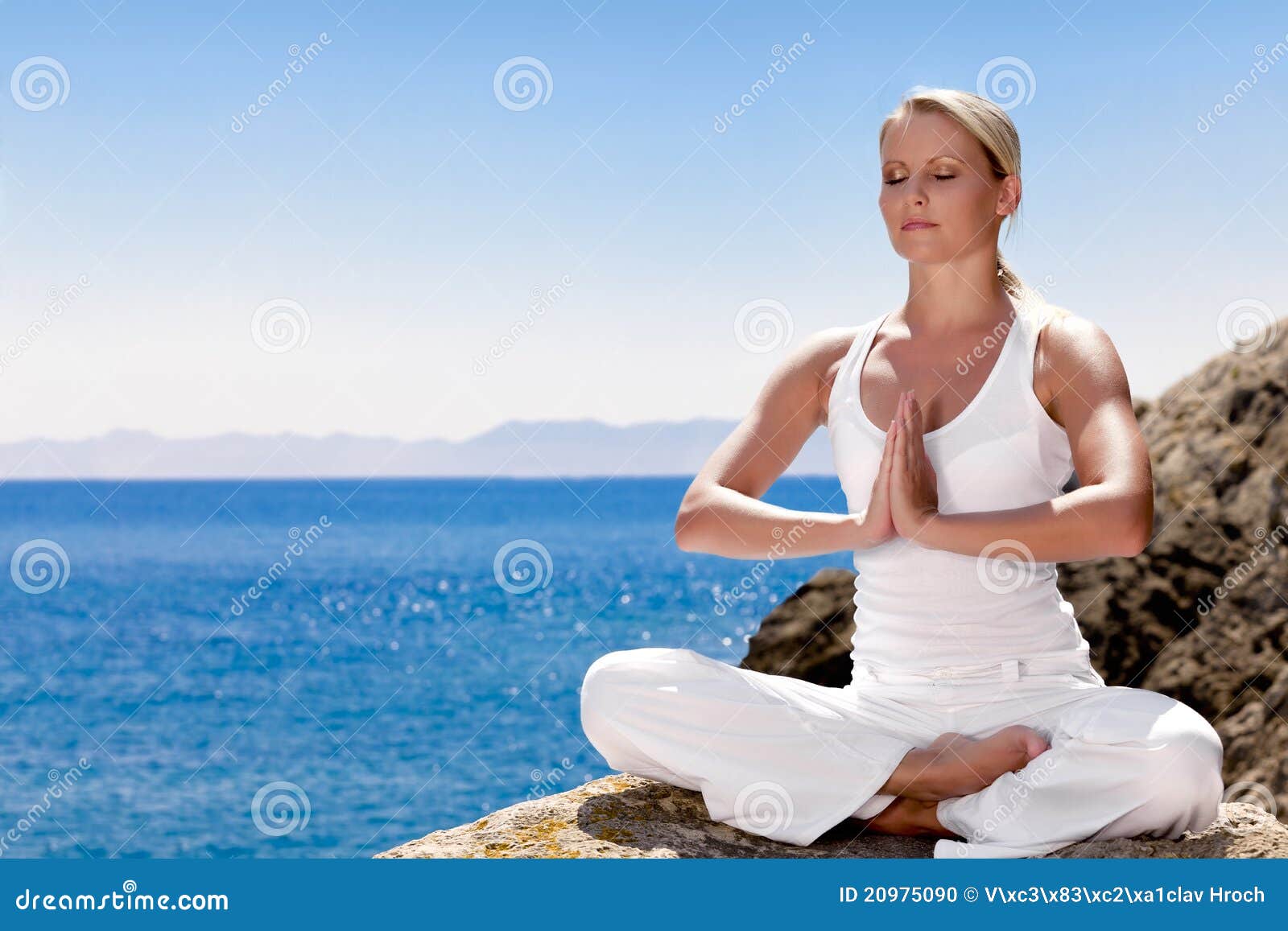 beautiful girl meditating in yoga pose