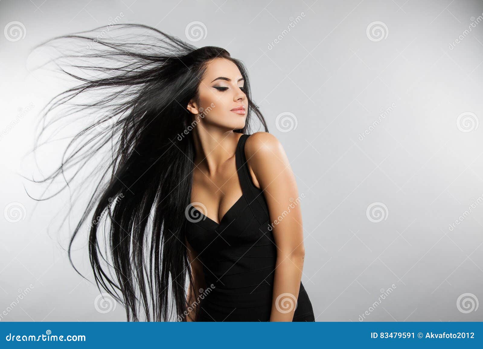 Woman Inside Of A Dark Mysterious Black Cloth Blowing In The Wind