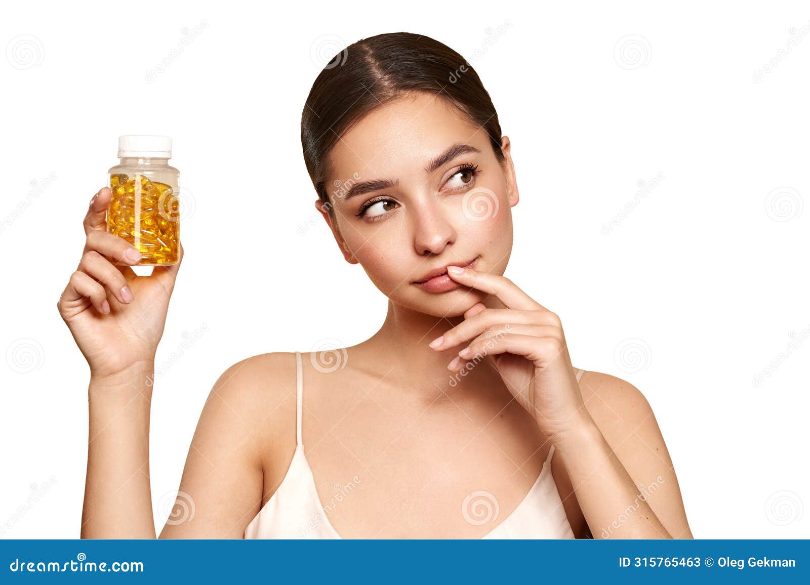 beautiful girl with pill with cod liver oil omega-3