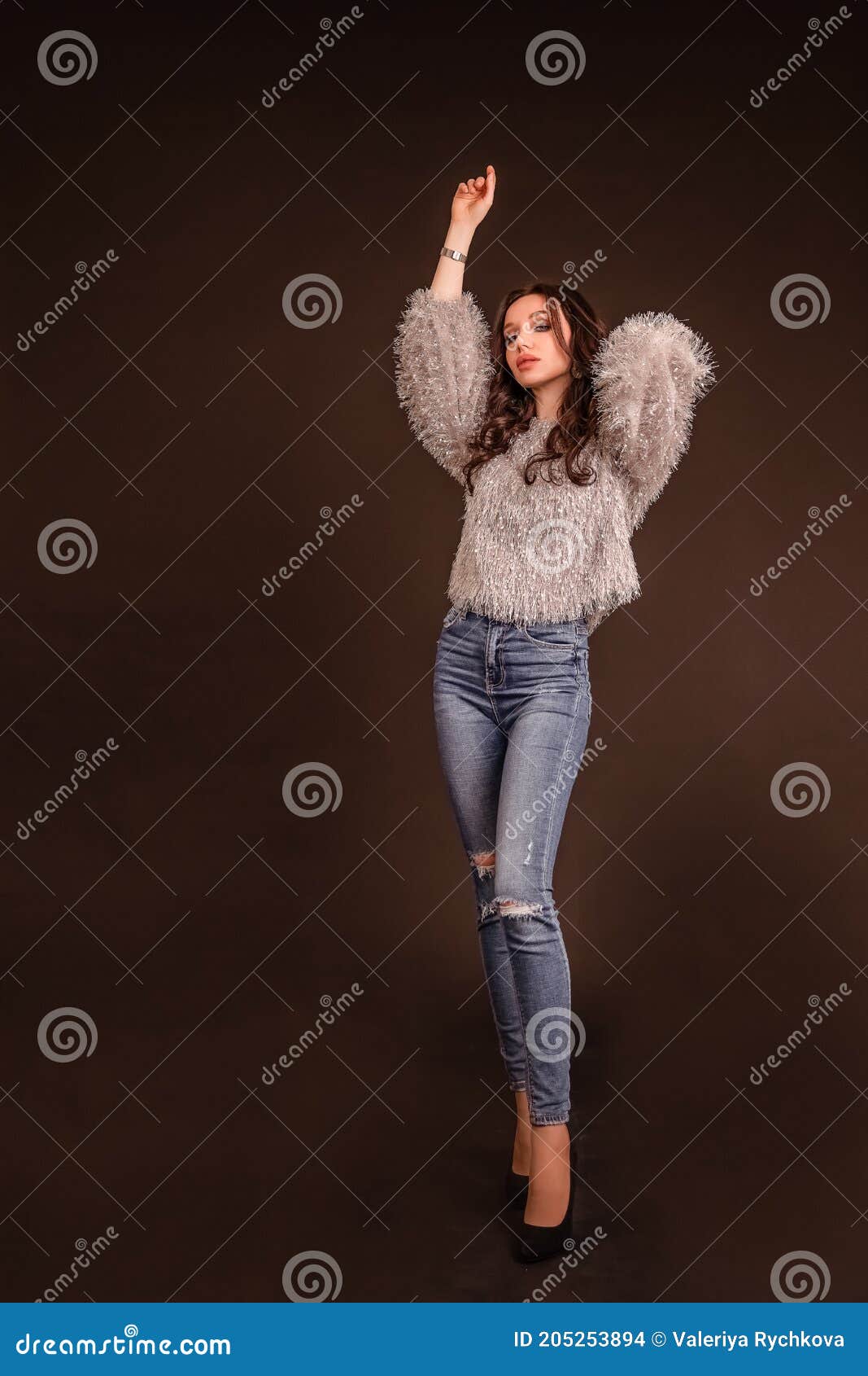 Beautiful Girl Poses For Camera In The City Stock Photo - Download Image  Now - Brick, Yellow, Adult - iStock