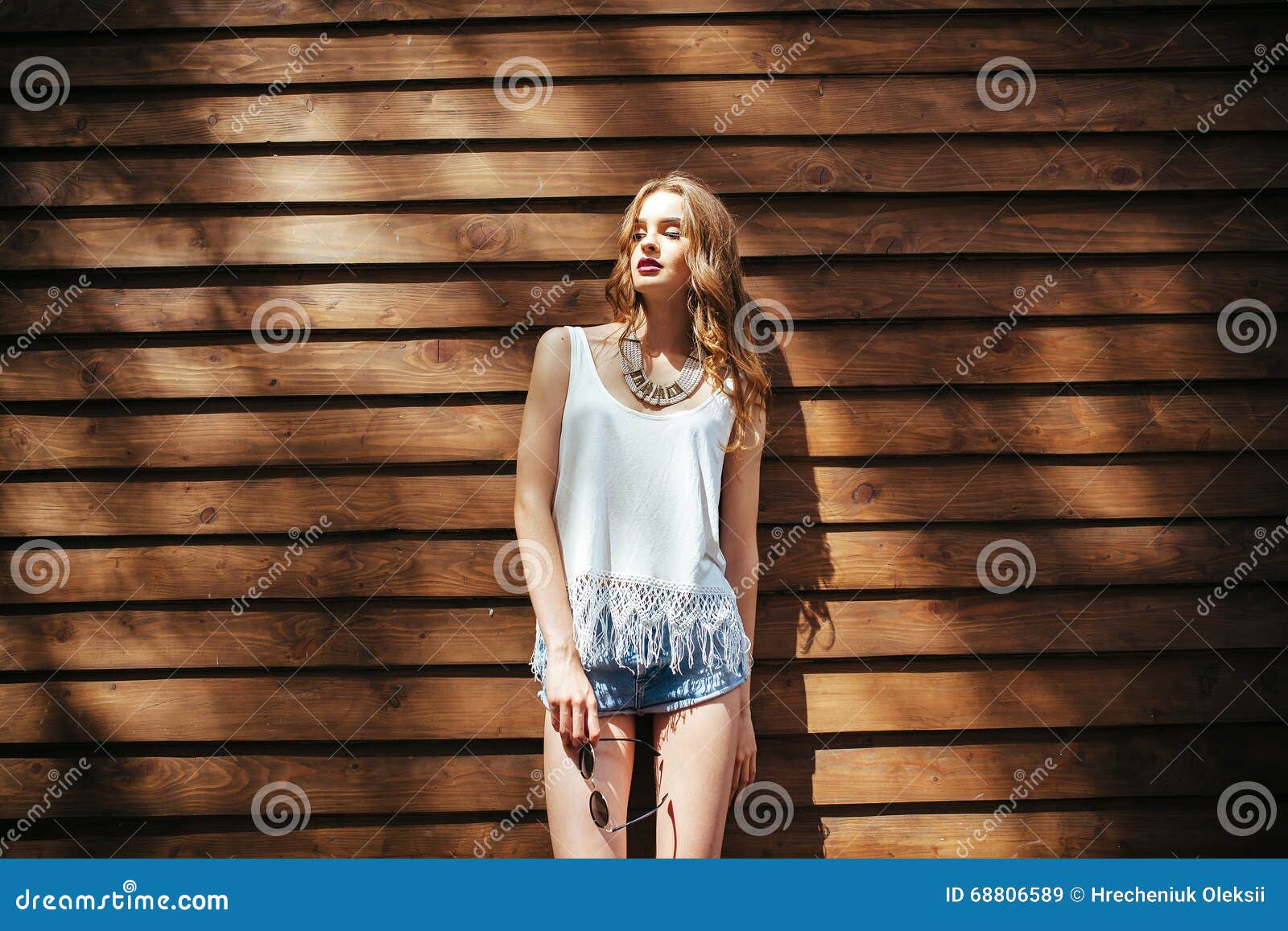 beautiful girl poses for camera in the city stock photo (160632) -  YouWorkForThem