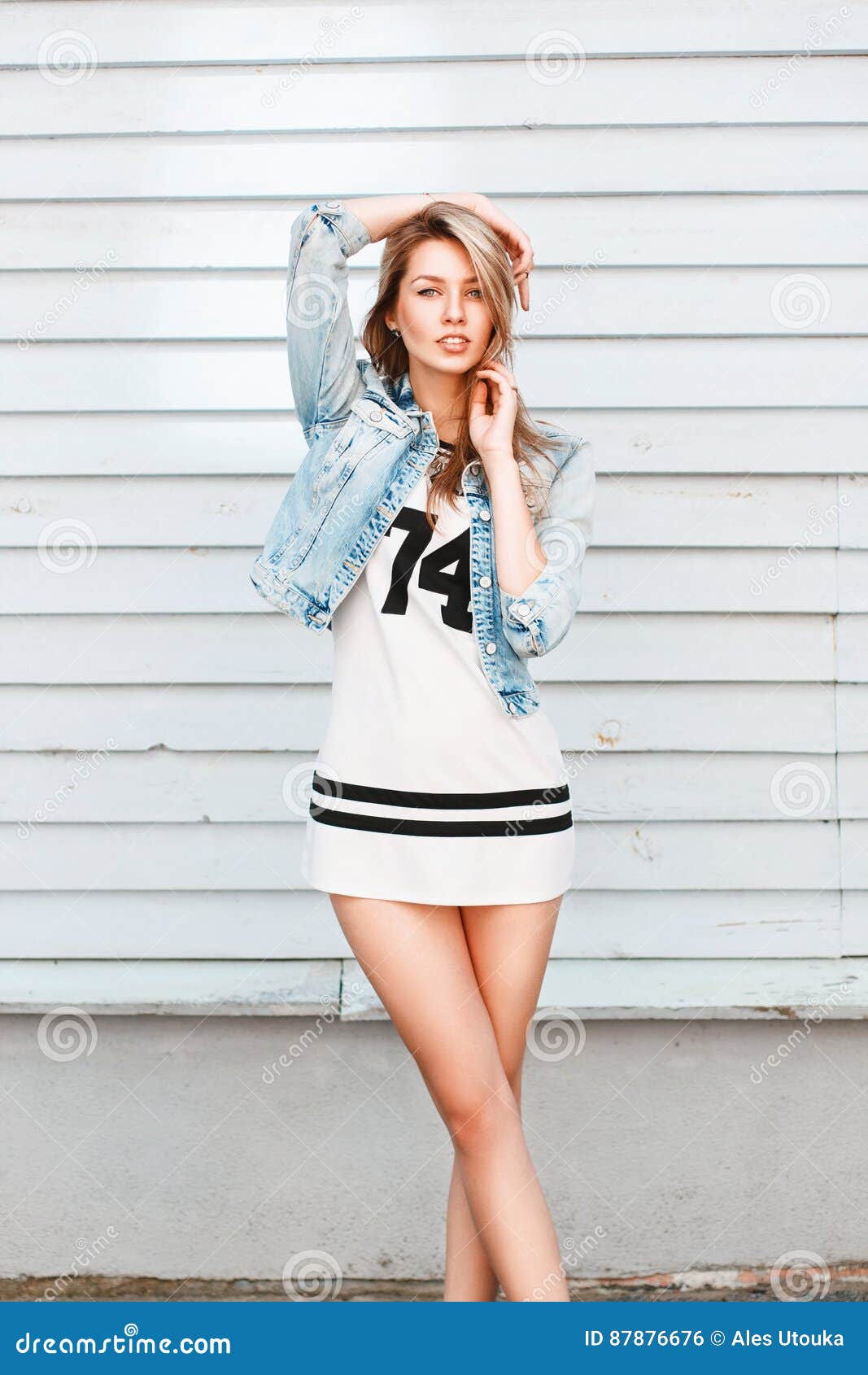 Beautiful Girl Posing Near a White Wooden Wall at the Beach. Stock ...