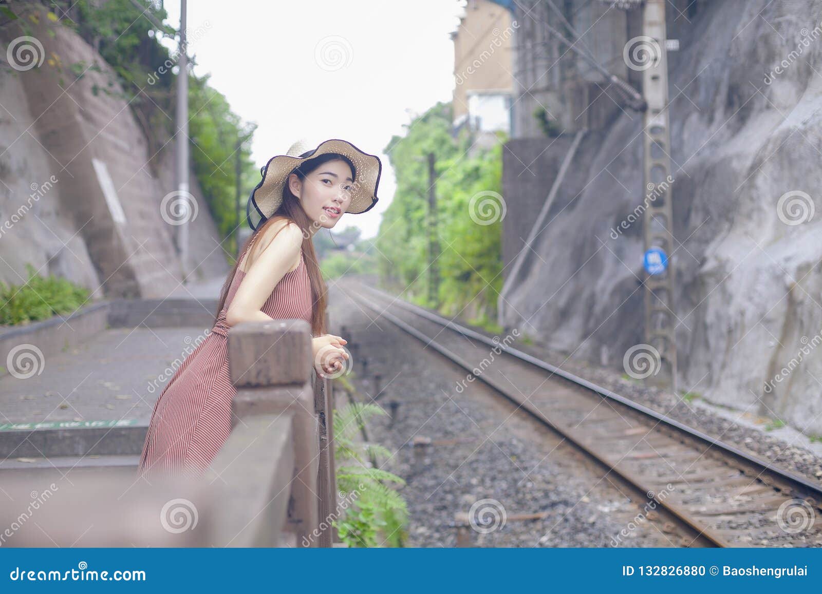 beautiful girl and railway background