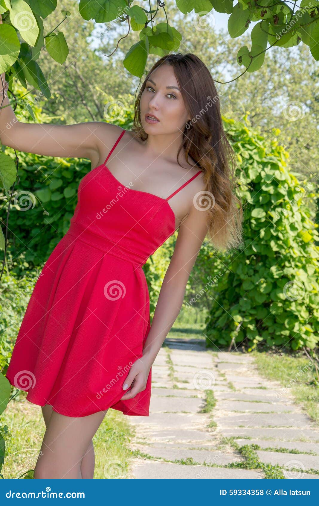 Beautiful Girl In A Red Dress Stock Photo - Image: 59334358