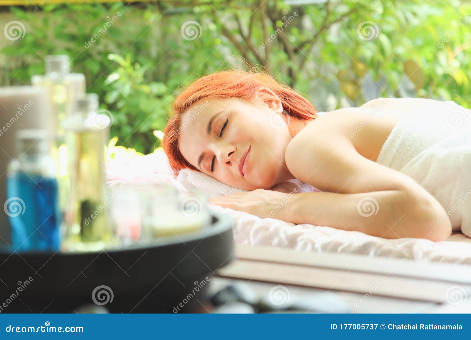 Beautiful Girl Resting Relaxing In Spa Resort With Closed Eyes Woman Lying Down On Massage Beds