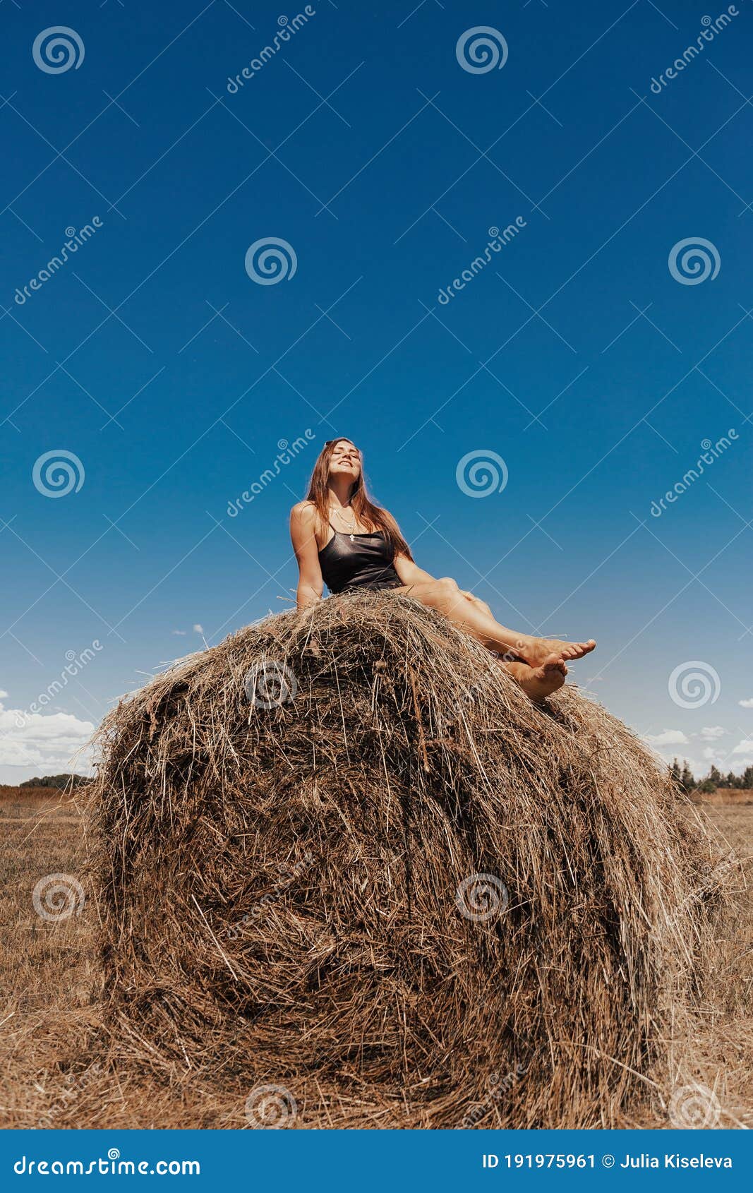 Beautiful Girl Is Resting After Work Girl On The Field With Hay Woman