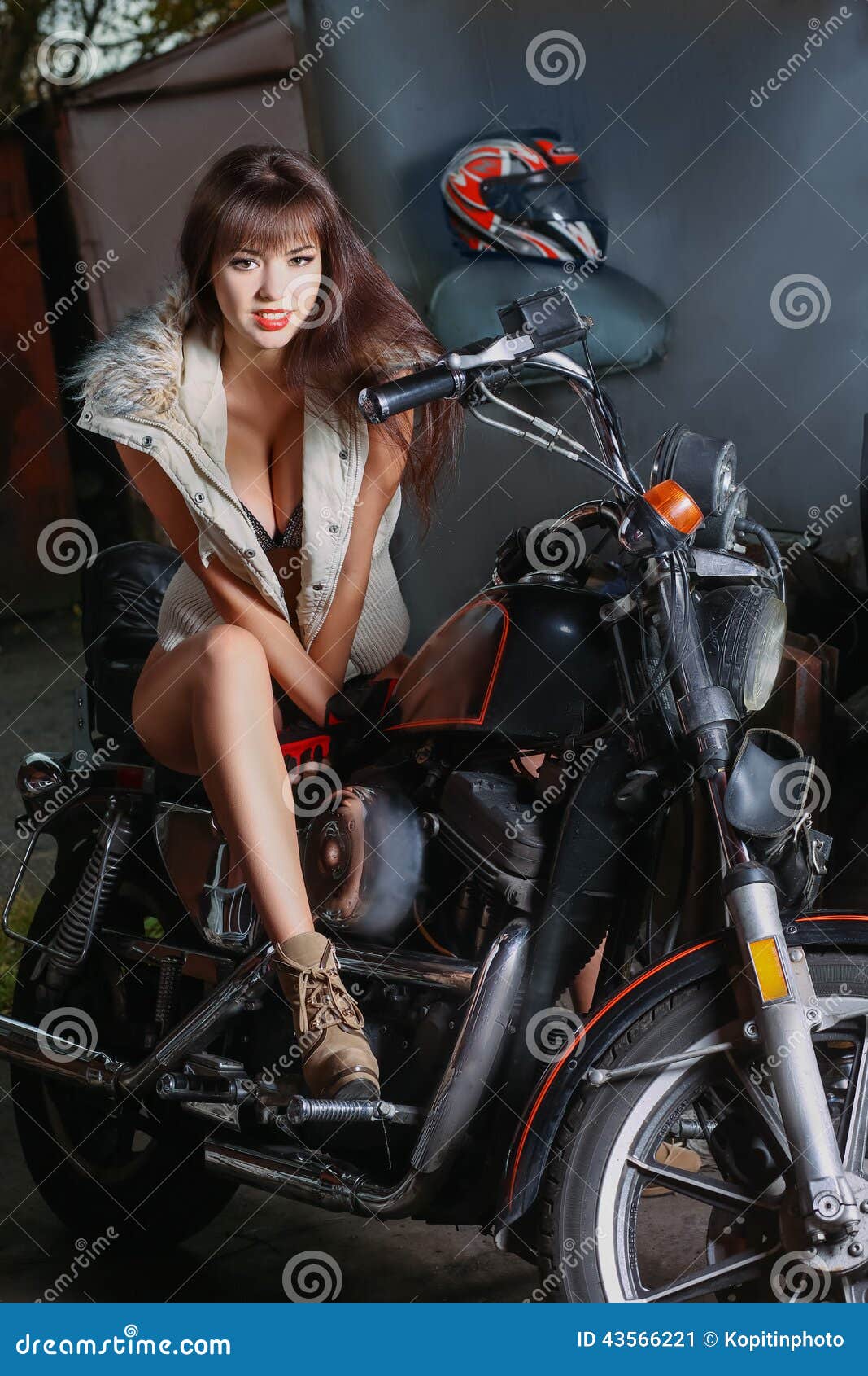 Beautiful Girl Is Sitting On A Motorcycle Stock Image