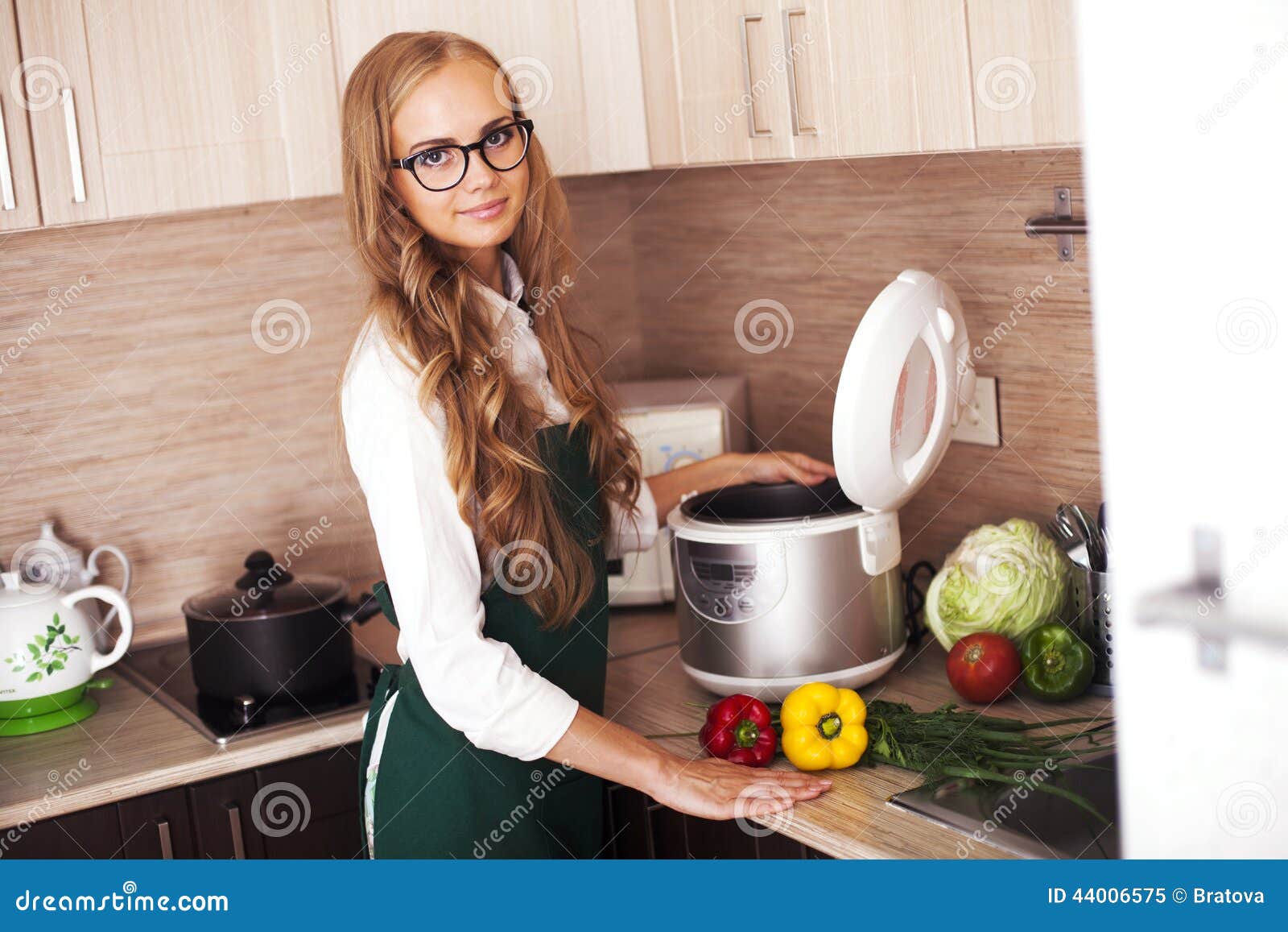 Beautiful Girl with Slo-cooker Stock Image - Image of cooker, home: 44006575