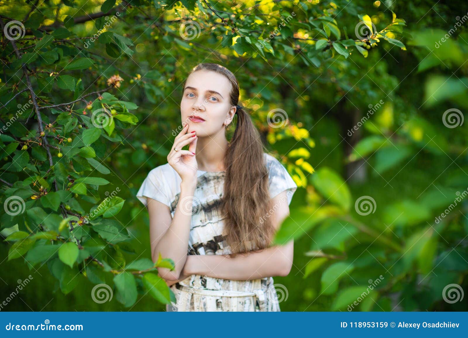 Beautiful Girl is Standing Near the Green Tree Stock Image - Image of ...