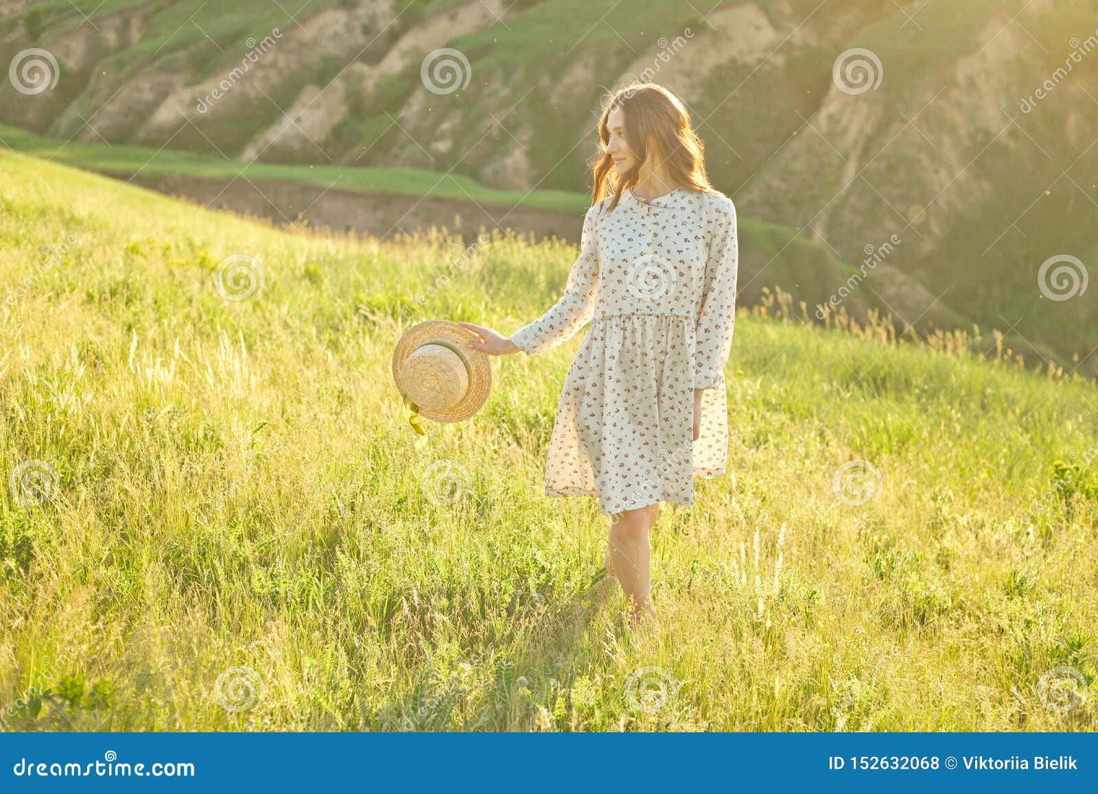 Beautiful Girl in a Summer Sundress Walks through the Mountains in Her ...