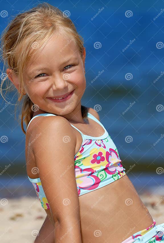 Beautiful Girl On A Sandy Beach Blue Sea In Background Stock Image Image Of Girl Happiness
