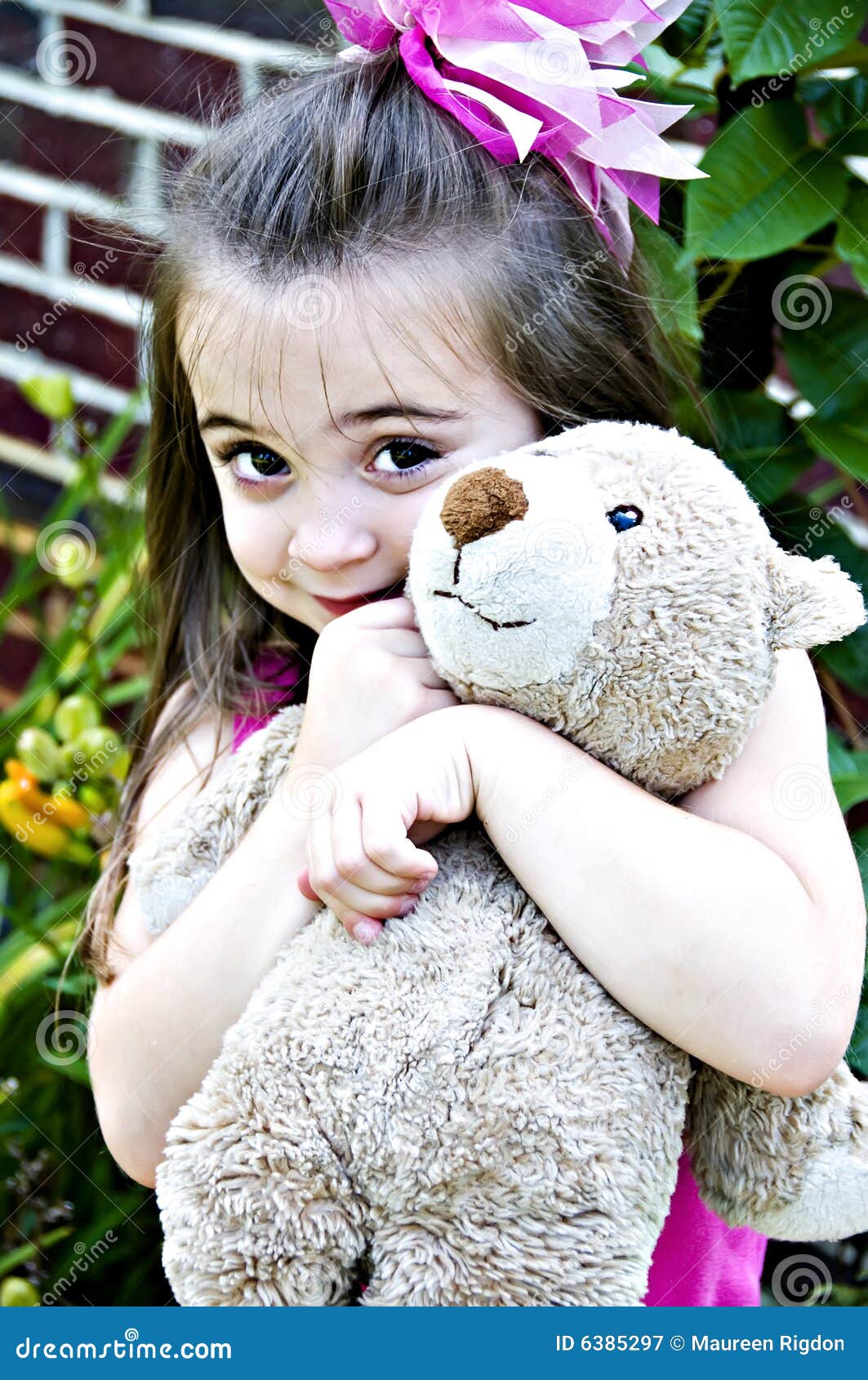 girls with teddy bear