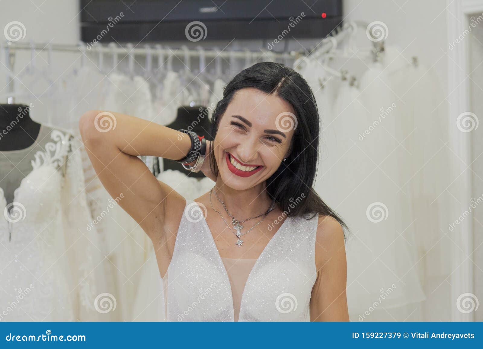 Beautiful Girl Tries On A Wedding Dress In A Bridal Salon Stock Image