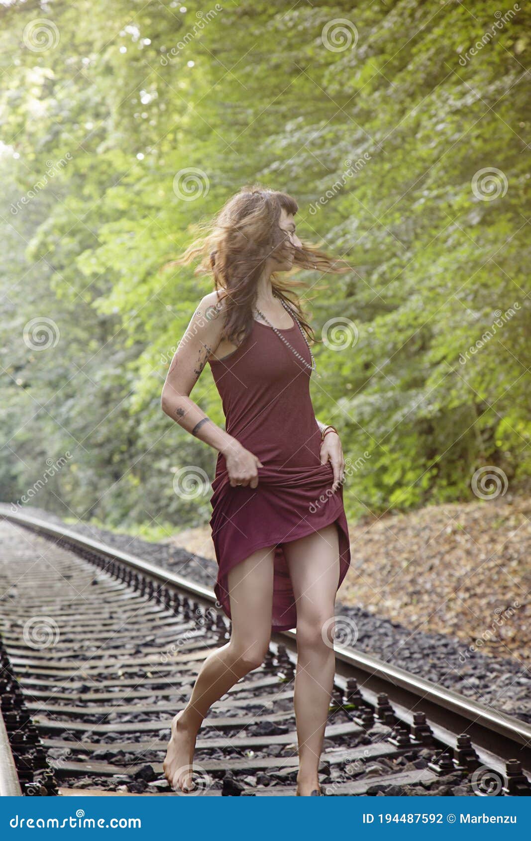 https://thumbs.dreamstime.com/z/beautiful-girl-walking-empty-railway-forest-girl-walking-empty-railway-forest-194487592.jpg