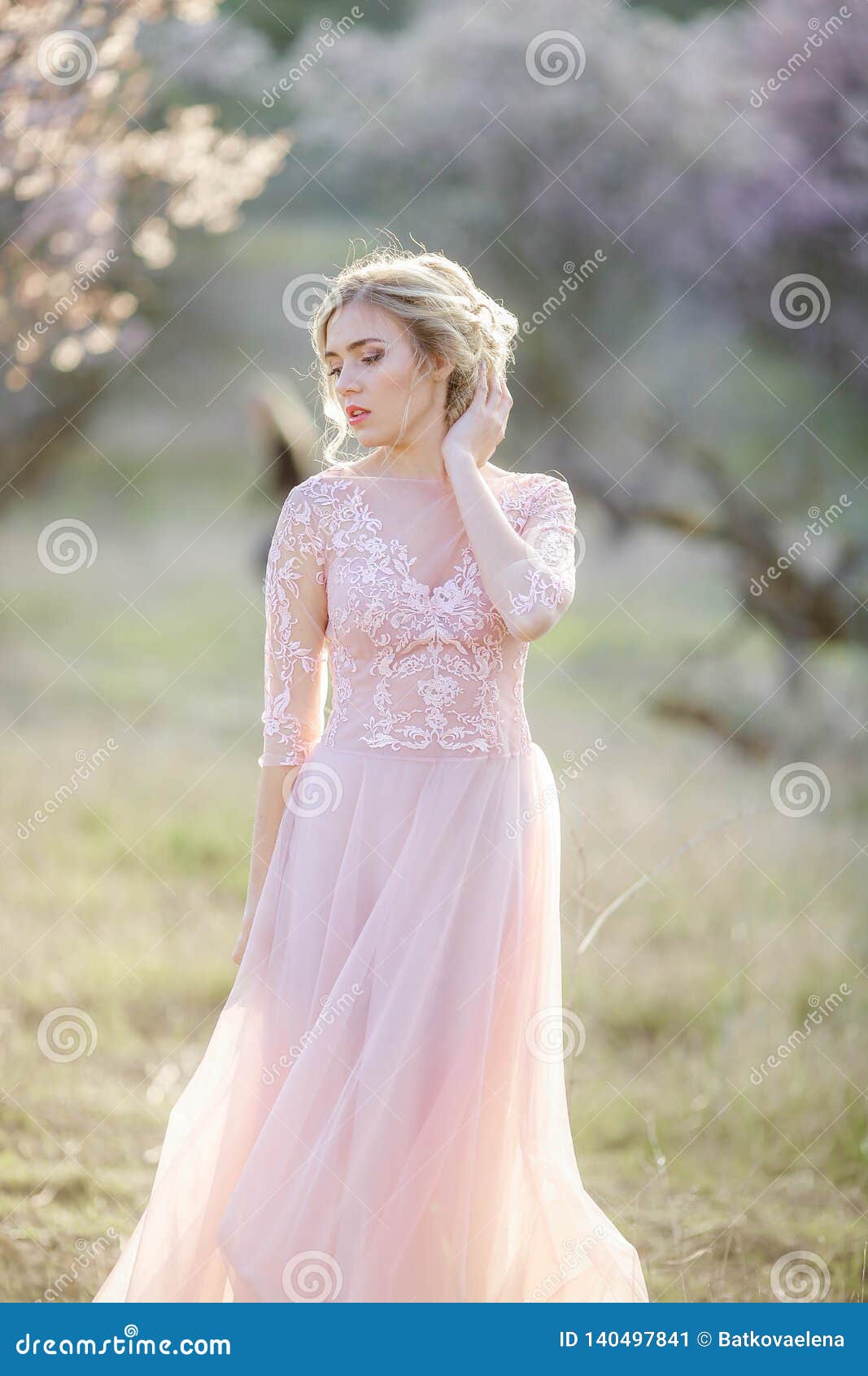 Beautiful Girl Wearing a Bridal Gown in a Pink Forest Stock Image ...